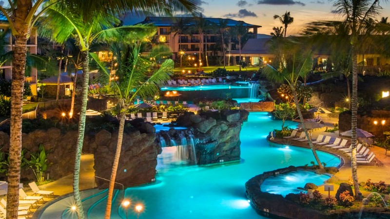 Koloa Landing all-inclusive Hawaii adults-only resort with nighttime pool views.