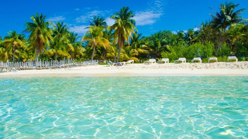 Playa Norte on Isla Mujeres boasts white sand and shallow, crystal-clear waters.