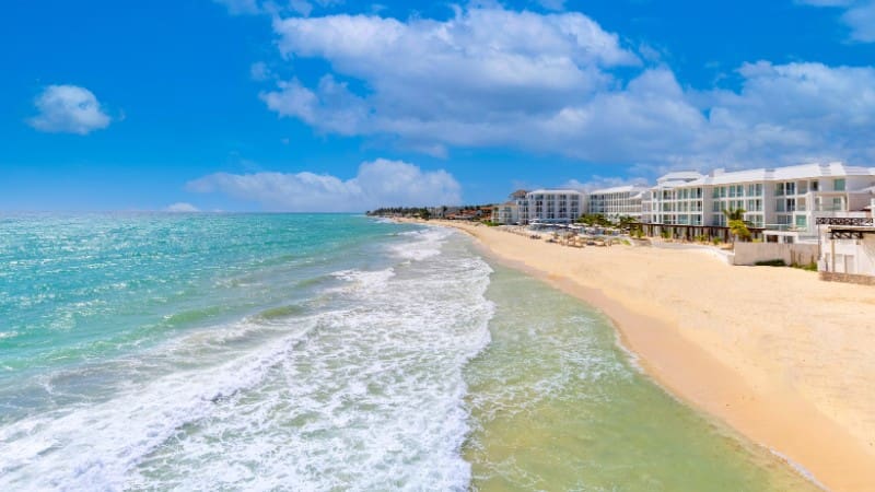 Pristine turquoise waters and luxurious beachfront buildings make Playa Playacar special.