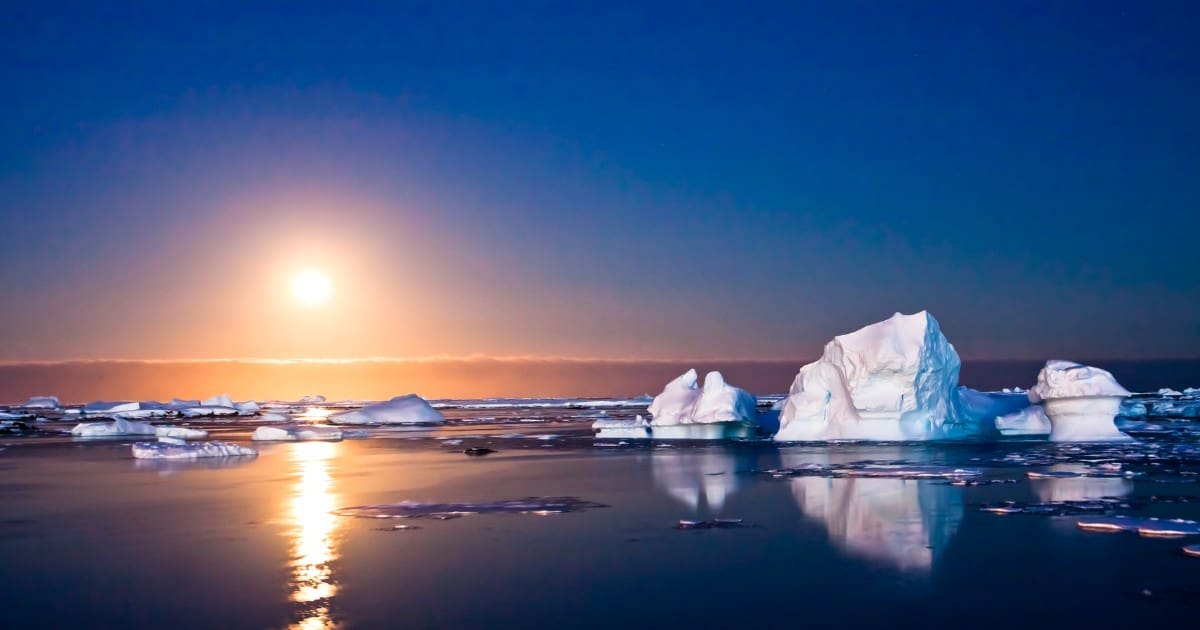 Learn how to get to Antarctica and witness stunning sunsets over the icy landscape.