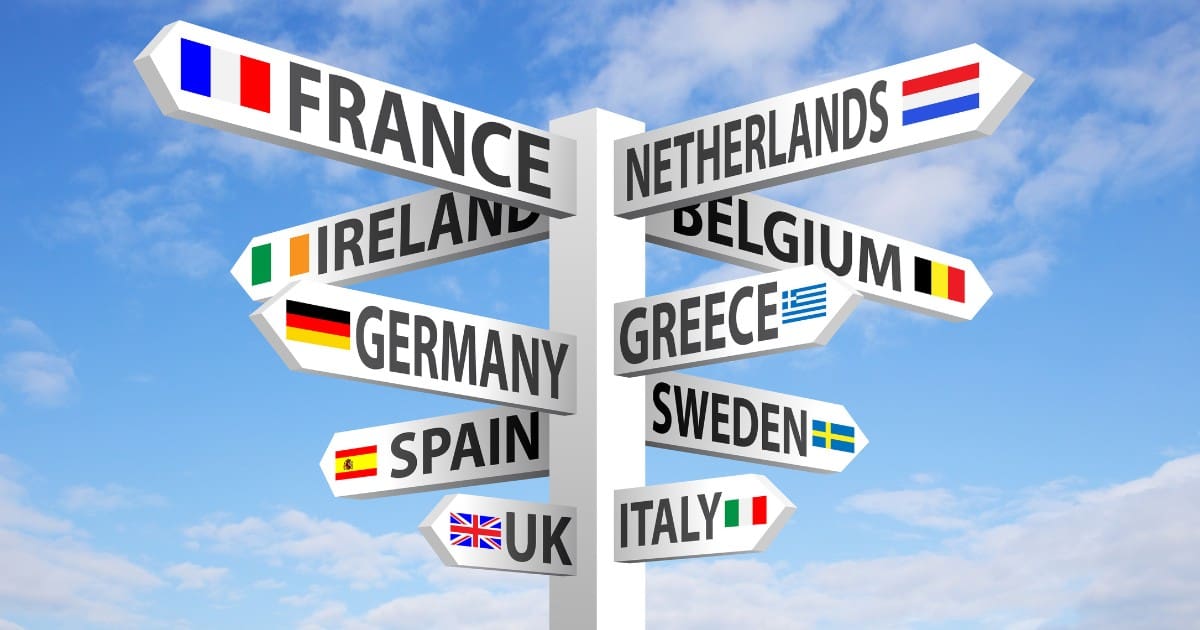 Directional signpost of European countries for families traveling to Europe with kids.