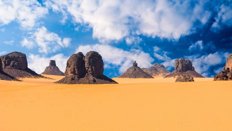 The towering rock formations of Tadrart Rouge in Algeria's Sahara are a natural wonder.