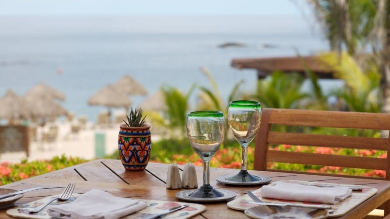 Enjoy beachfront dining at one of the best restaurants in Seminyak with ocean views.