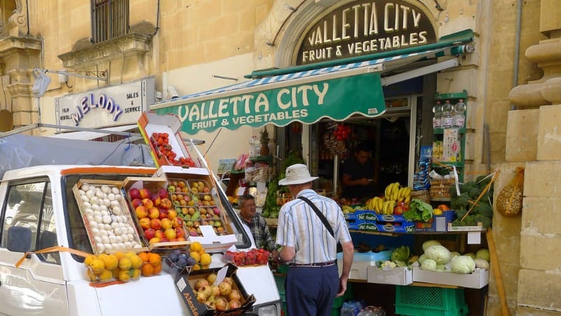 Explore Valletta City's fruit and vegetable market for local produce and street food.