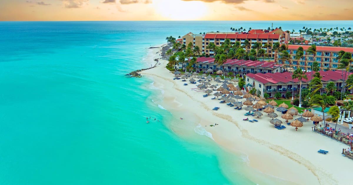 Follow Aruba travel tips to find stunning beachfront resorts with turquoise waters.