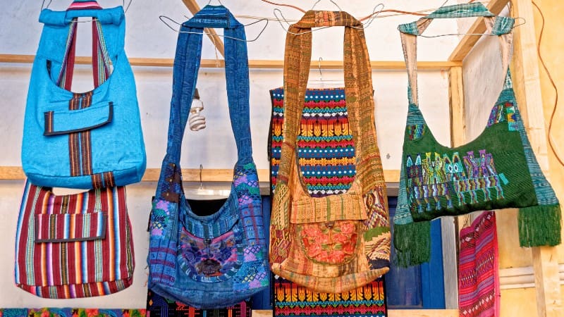 Vibrant handwoven MayaBags, traditional Belizean souvenirs on display.